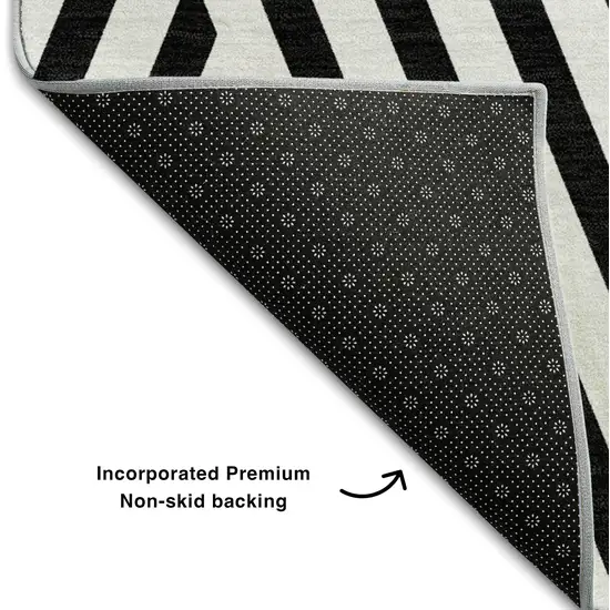 8' Black And Ivory Geometric Washable Round Rug With UV Protection Photo 6