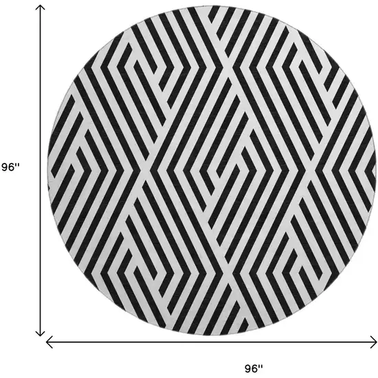 8' Black And Ivory Geometric Washable Round Rug With UV Protection Photo 9
