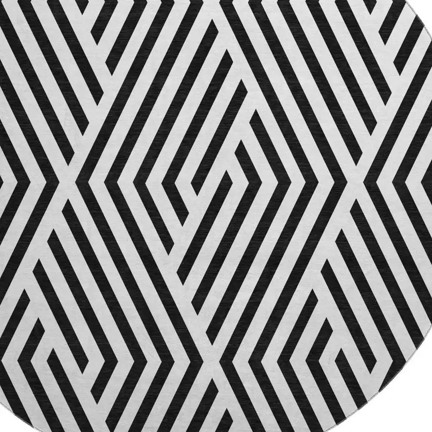 8' Black And Ivory Geometric Washable Round Rug With UV Protection Photo 3