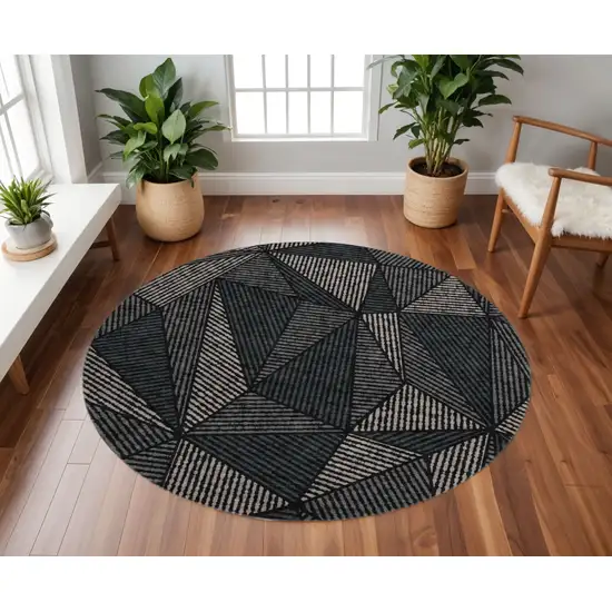 8' Black And Ivory Geometric Washable Round Rug With UV Protection Photo 2