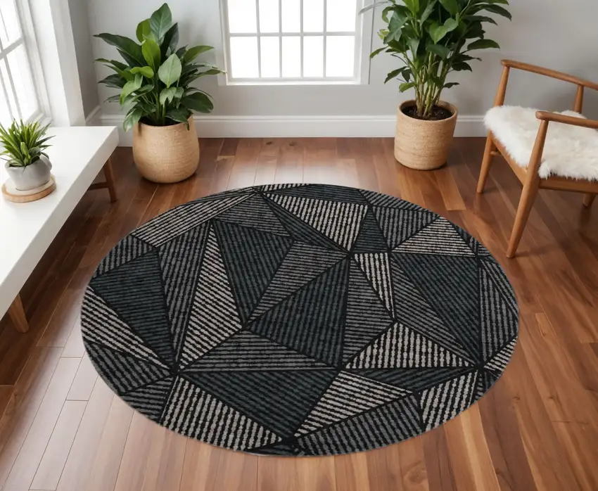 8' Black And Ivory Geometric Washable Round Rug With UV Protection Photo 2