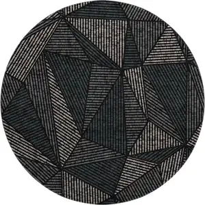 Photo of 8' Black And Ivory Geometric Washable Round Rug With UV Protection