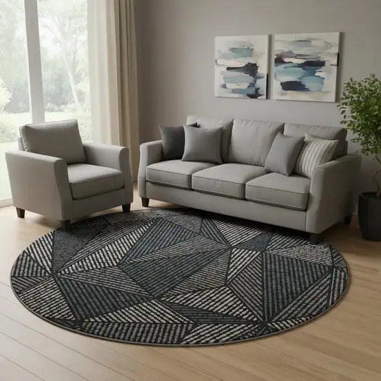 8' Black And Ivory Geometric Washable Round Rug With UV Protection Photo 1