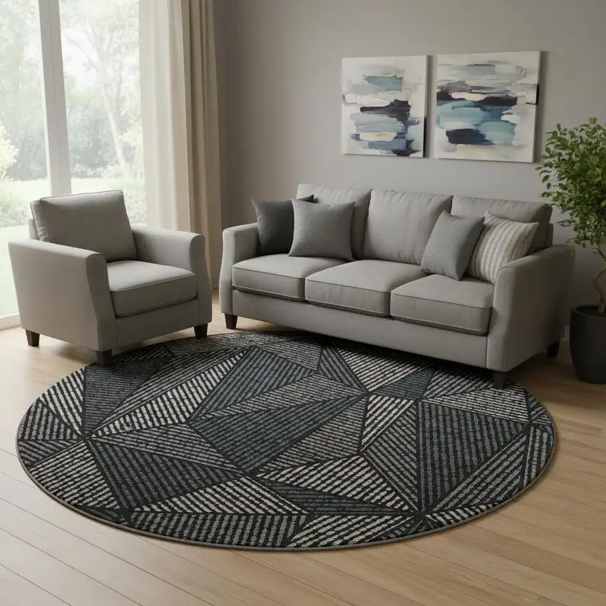 8' Black And Ivory Geometric Washable Round Rug With UV Protection Photo 1