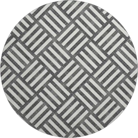 8' Black And Ivory Geometric Washable Round Rug With UV Protection Photo 1