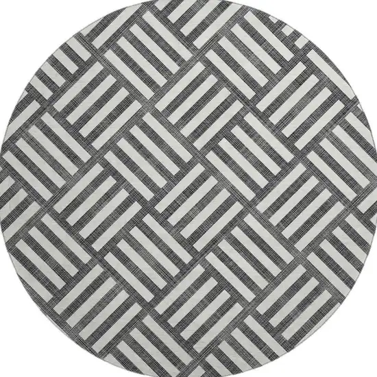 8' Black And Ivory Geometric Washable Round Rug With UV Protection Photo 3
