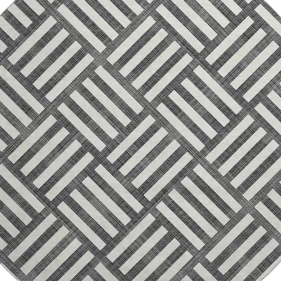 8' Black And Ivory Geometric Washable Round Rug With UV Protection Photo 2
