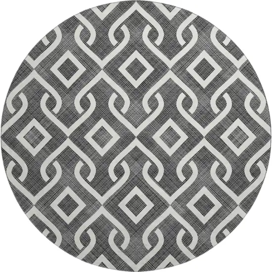 8' Black And Ivory Geometric Washable Round Rug With UV Protection Photo 1