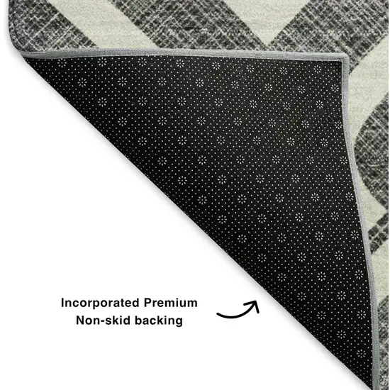 8' Black And Ivory Geometric Washable Round Rug With UV Protection Photo 5