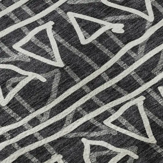 8' Black And Ivory Geometric Washable Round Rug With UV Protection Photo 9