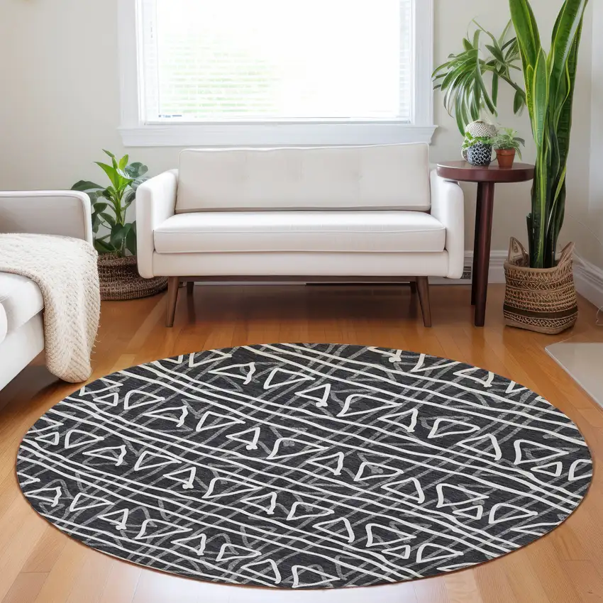 8' Black And Ivory Geometric Washable Round Rug With UV Protection Photo 5