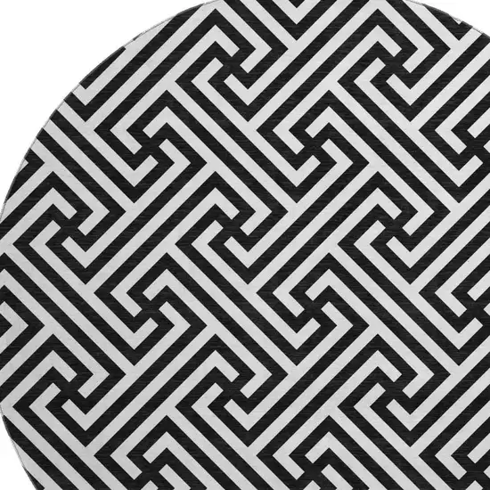 8' Black And Ivory Geometric Washable Round Rug With UV Protection Photo 3