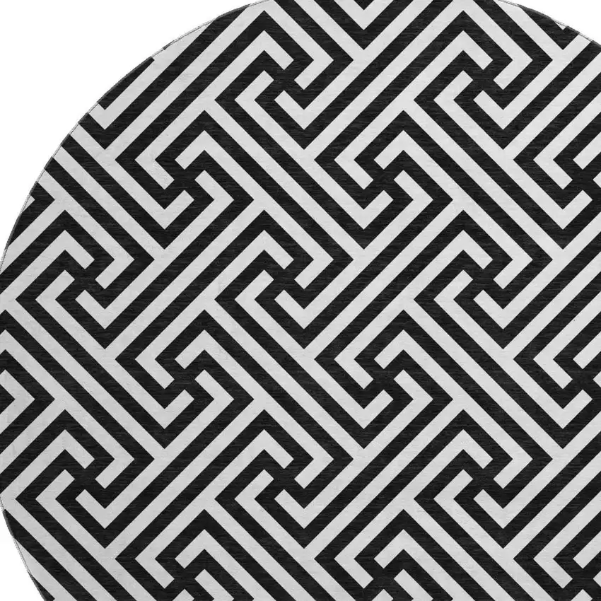 8' Black And Ivory Geometric Washable Round Rug With UV Protection Photo 3