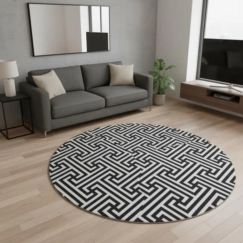 8' Black And Ivory Geometric Washable Round Rug With UV Protection Photo 2