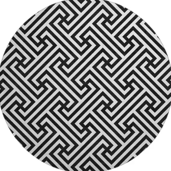 8' Black And Ivory Geometric Washable Round Rug With UV Protection Photo 4