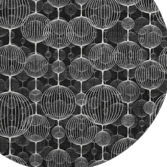 8' Black And Ivory Geometric Washable Round Rug With UV Protection Photo 3