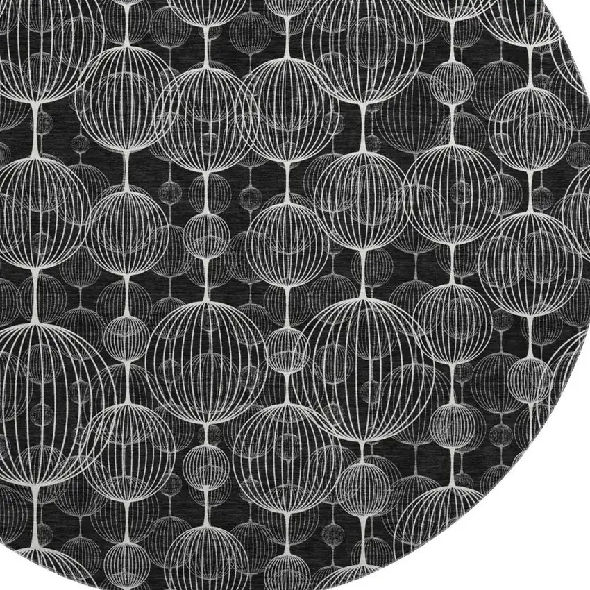 8' Black And Ivory Geometric Washable Round Rug With UV Protection Photo 3