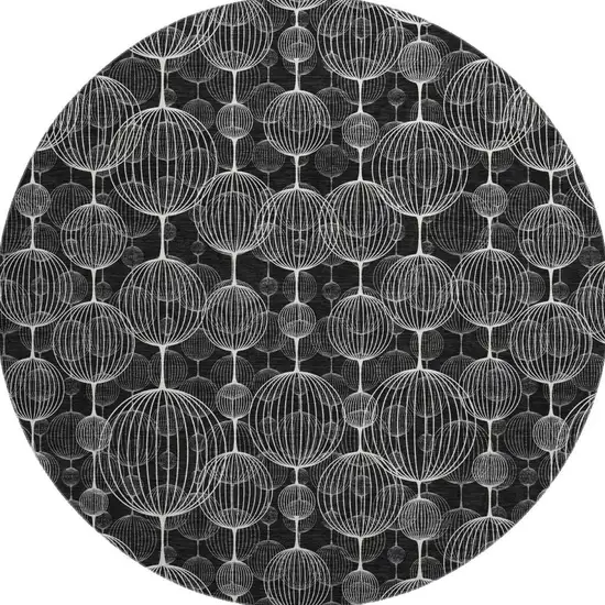 8' Black And Ivory Geometric Washable Round Rug With UV Protection Photo 4