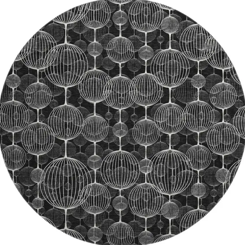 8' Black And Ivory Geometric Washable Round Rug With UV Protection Photo 4