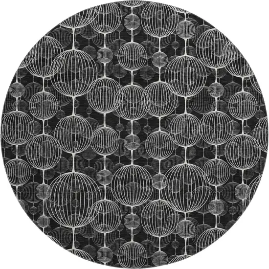 8' Black And Ivory Geometric Washable Round Rug With UV Protection Photo 1