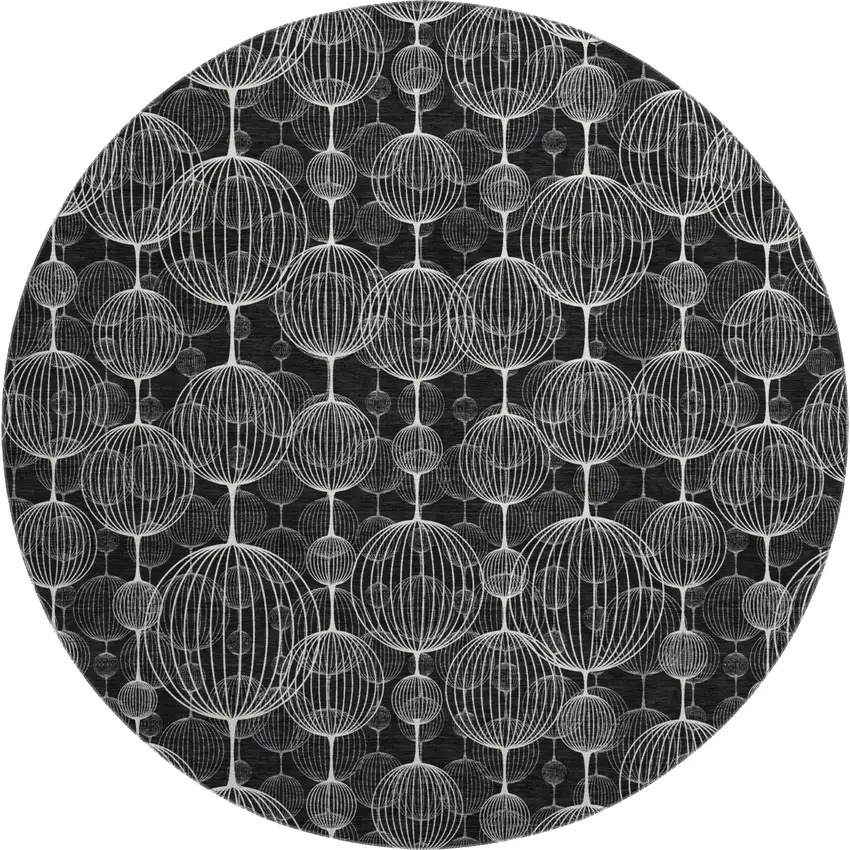 8' Black And Ivory Geometric Washable Round Rug With UV Protection Photo 1