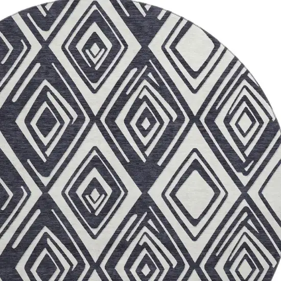 8' Black And Ivory Geometric Washable Round Rug With UV Protection Photo 4