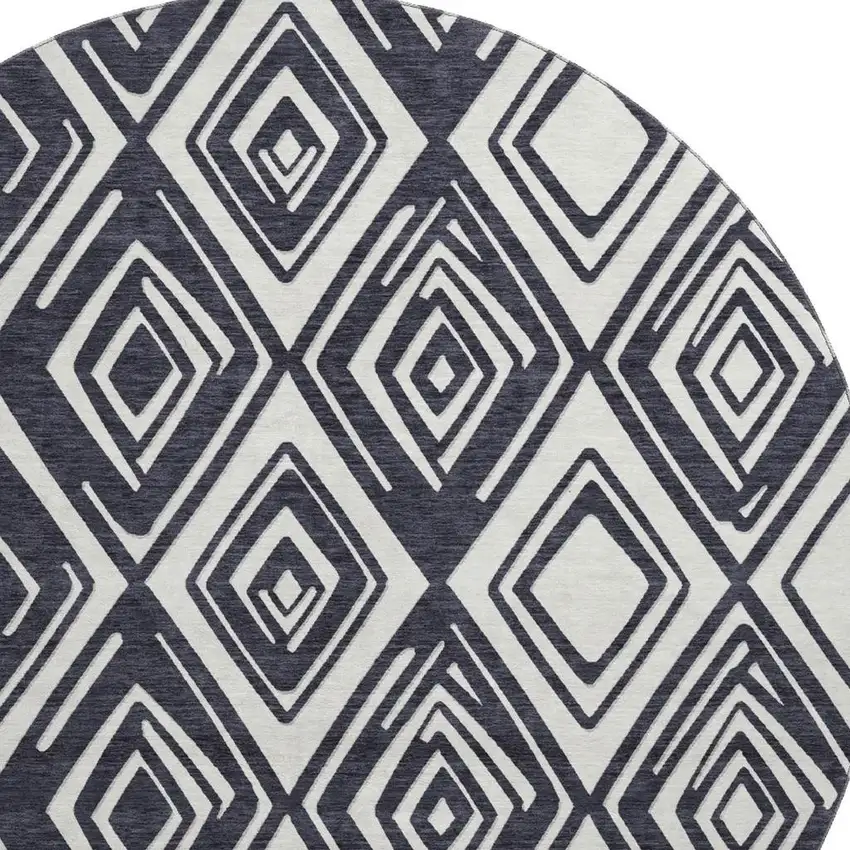 8' Black And Ivory Geometric Washable Round Rug With UV Protection Photo 4