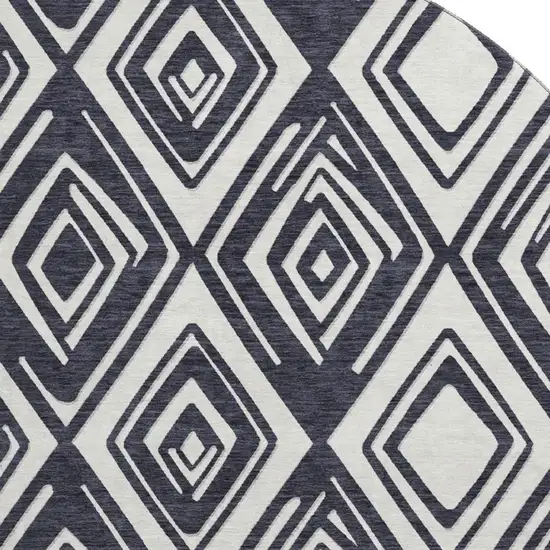 8' Black And Ivory Geometric Washable Round Rug With UV Protection Photo 3