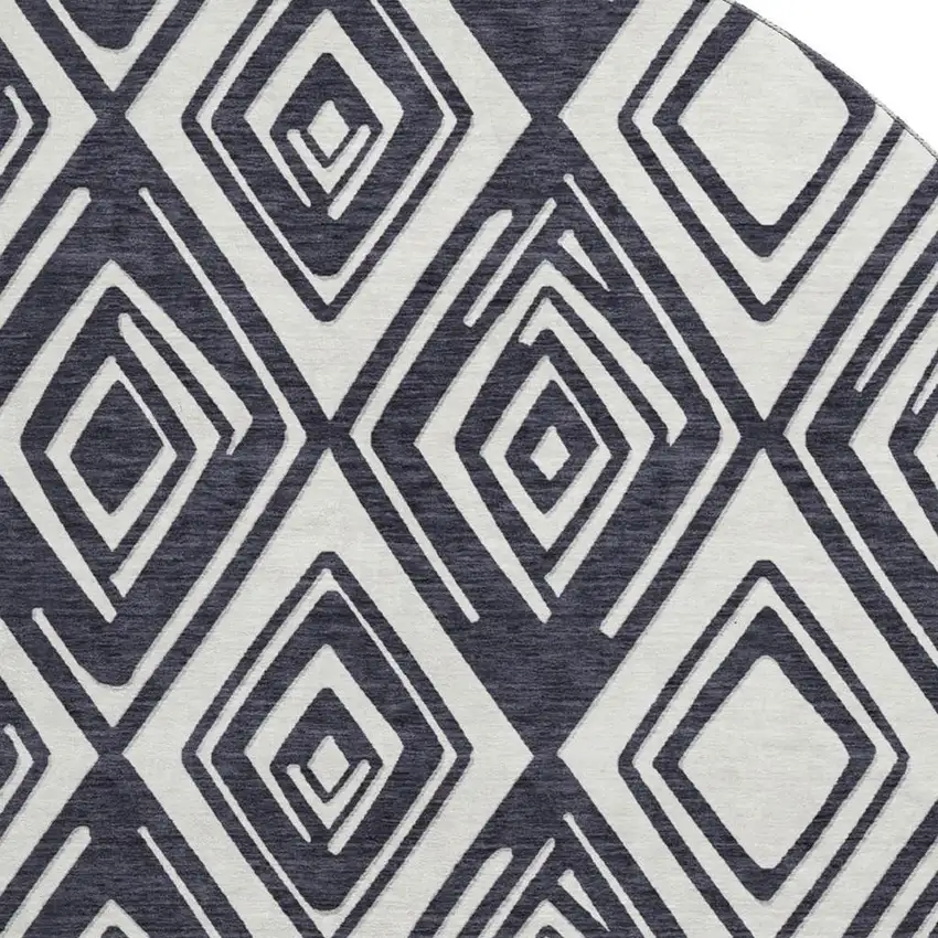 8' Black And Ivory Geometric Washable Round Rug With UV Protection Photo 3