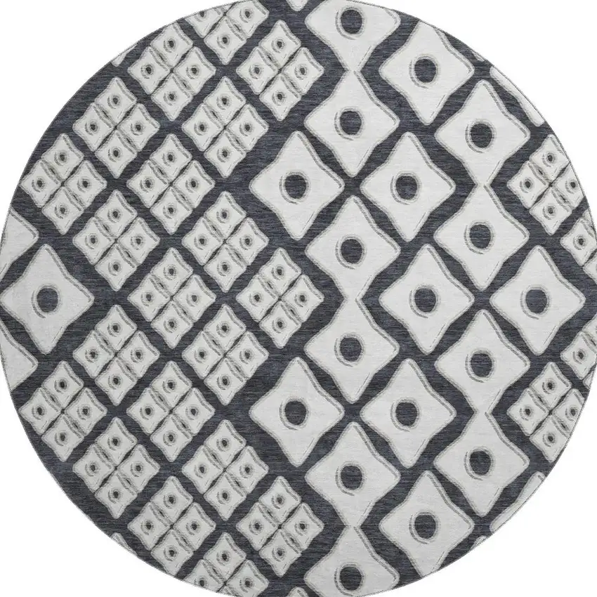 8' Black And Ivory Geometric Washable Round Rug With UV Protection Photo 4