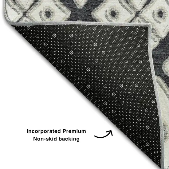 8' Black And Ivory Geometric Washable Round Rug With UV Protection Photo 7