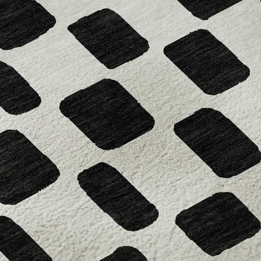 8' Black And Ivory Geometric Washable Round Rug With UV Protection Photo 9