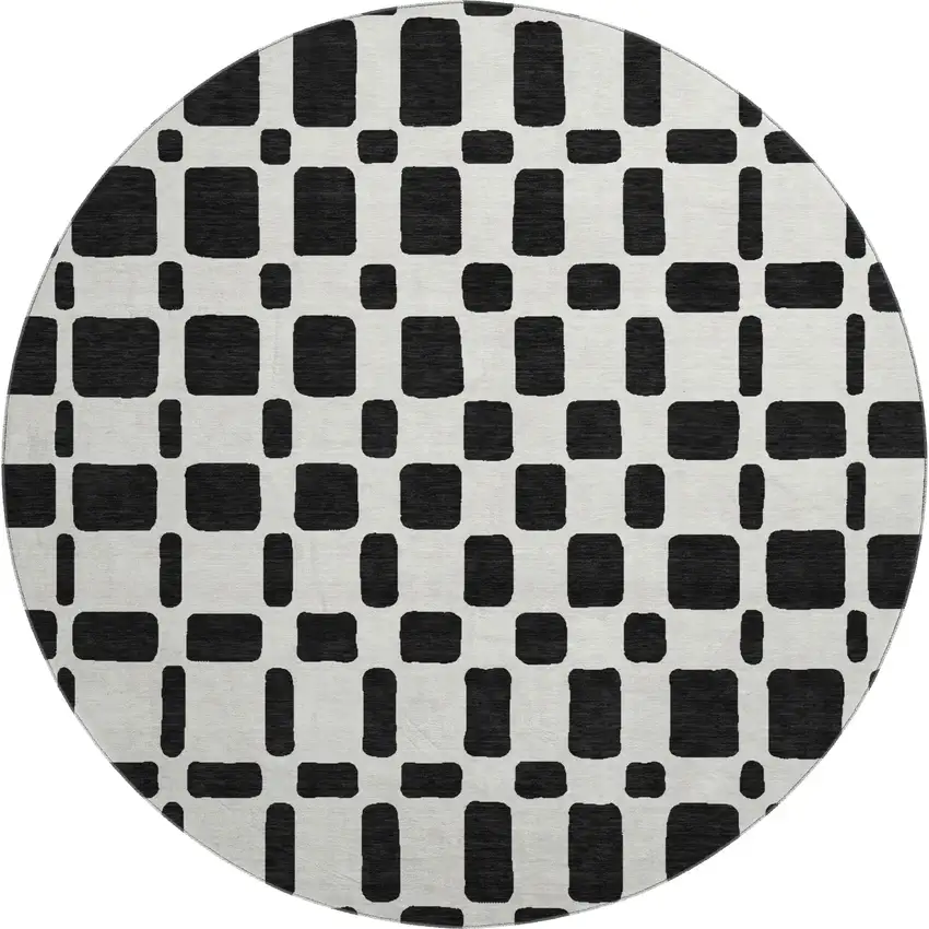 8' Black And Ivory Geometric Washable Round Rug With UV Protection Photo 1