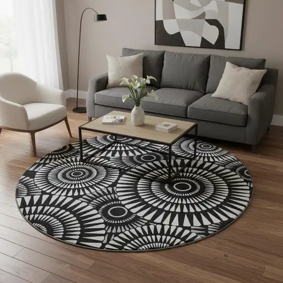 8' Black And Ivory Geometric Washable Round Rug With UV Protection Photo 2