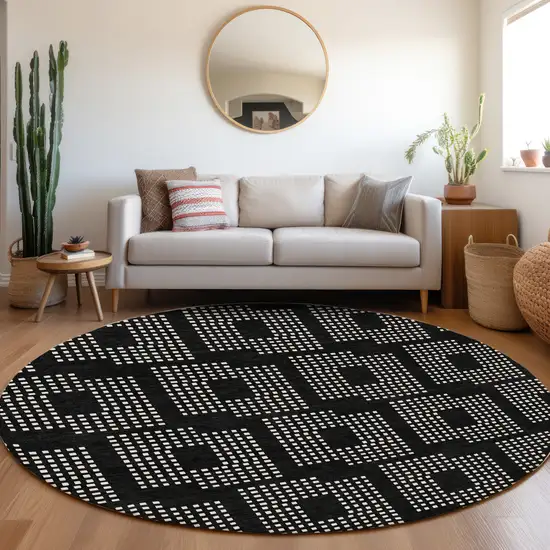 8' Black And Ivory Geometric Washable Round Rug With UV Protection Photo 5