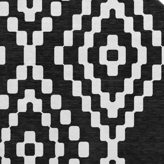 8' Black And Ivory Geometric Washable Round Rug With UV Protection Photo 3