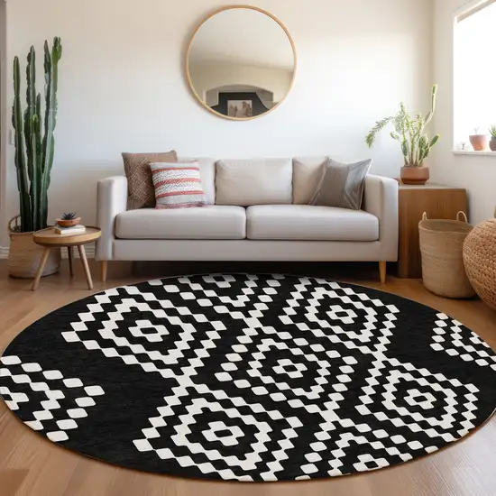 8' Black And Ivory Geometric Washable Round Rug With UV Protection Photo 5