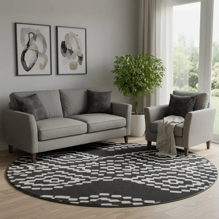 8' Black And Ivory Geometric Washable Round Rug With UV Protection Photo 1