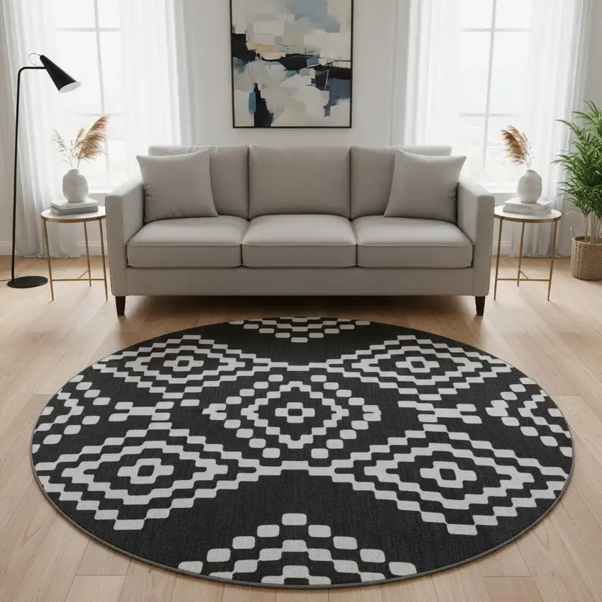 8' Black And Ivory Geometric Washable Round Rug With UV Protection Photo 2