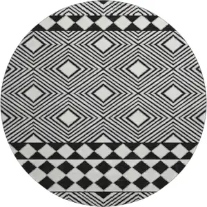 Photo of 8' Black And Ivory Geometric Washable Round Rug With UV Protection