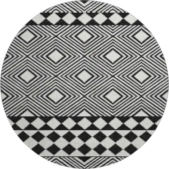 8' Black And Ivory Geometric Washable Round Rug With UV Protection Photo 1