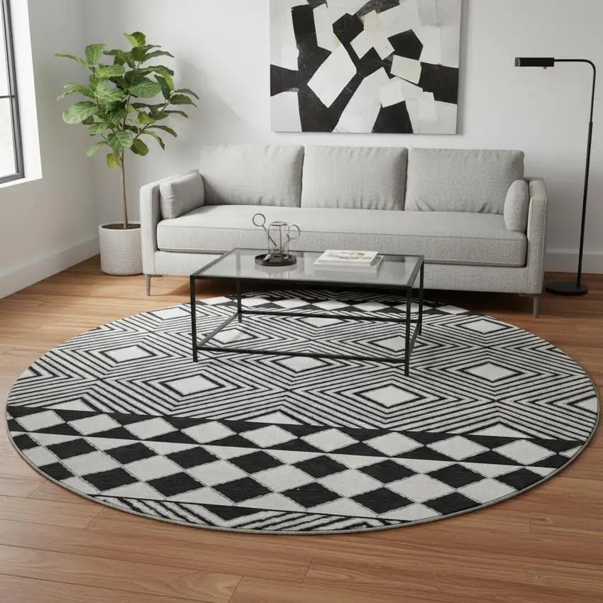 8' Black And Ivory Geometric Washable Round Rug With UV Protection Photo 2