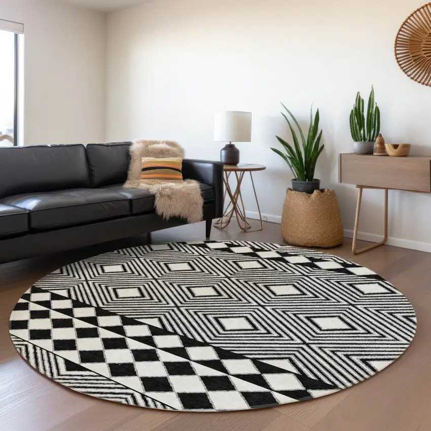8' Black And Ivory Geometric Washable Round Rug With UV Protection Photo 5