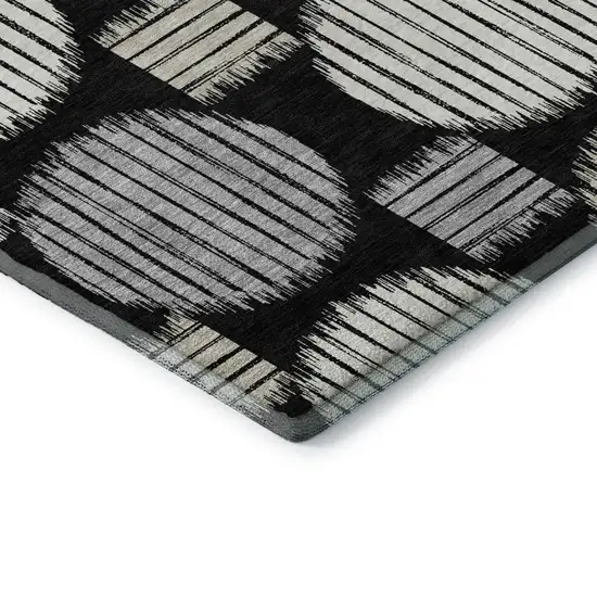 8' Black And Ivory Geometric Washable Round Rug With UV Protection Photo 6