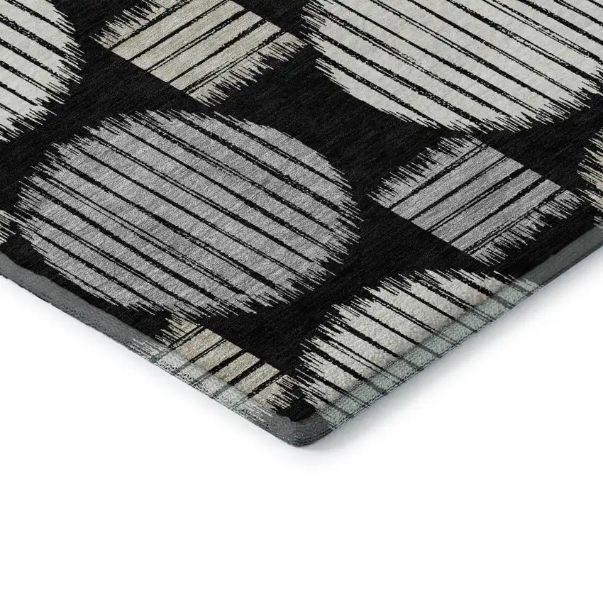 8' Black And Ivory Geometric Washable Round Rug With UV Protection Photo 6