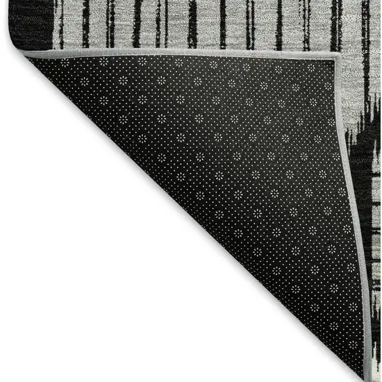 8' Black And Ivory Geometric Washable Round Rug With UV Protection Photo 5