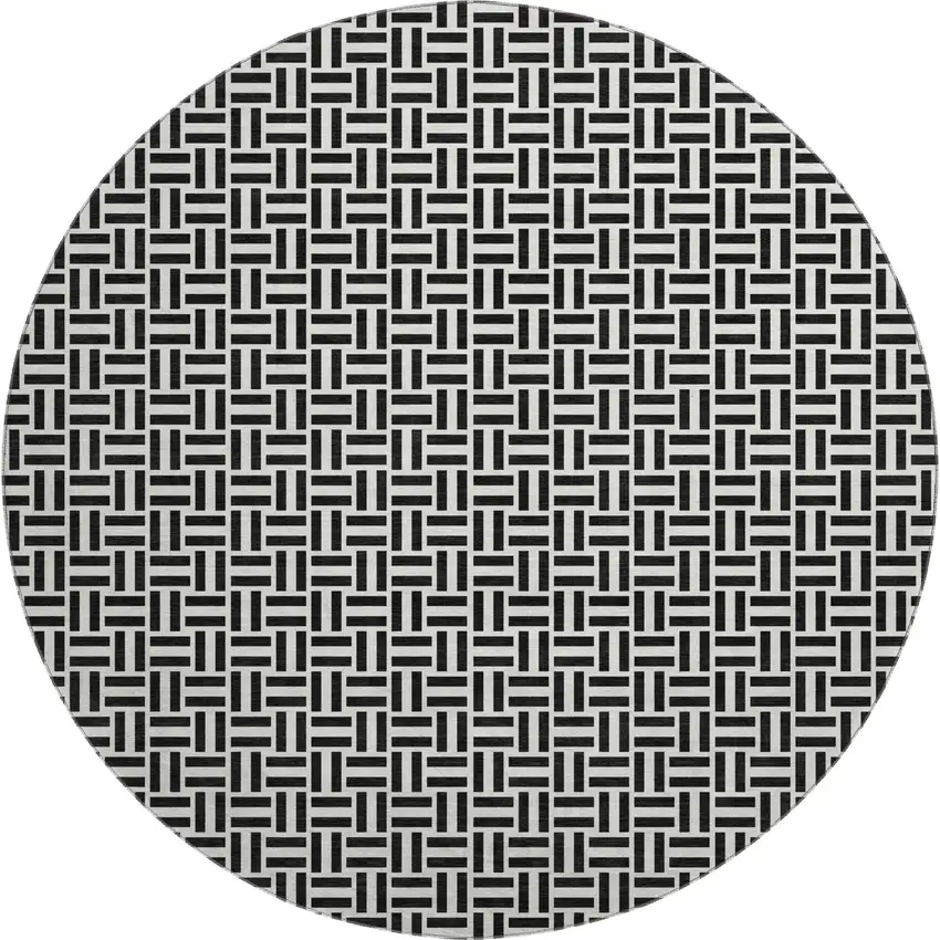 8' Black And Ivory Geometric Washable Round Rug With UV Protection Photo 1