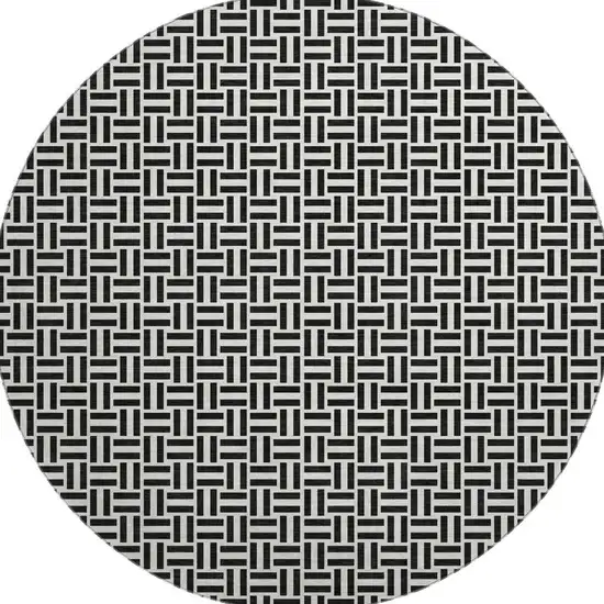 8' Black And Ivory Geometric Washable Round Rug With UV Protection Photo 4