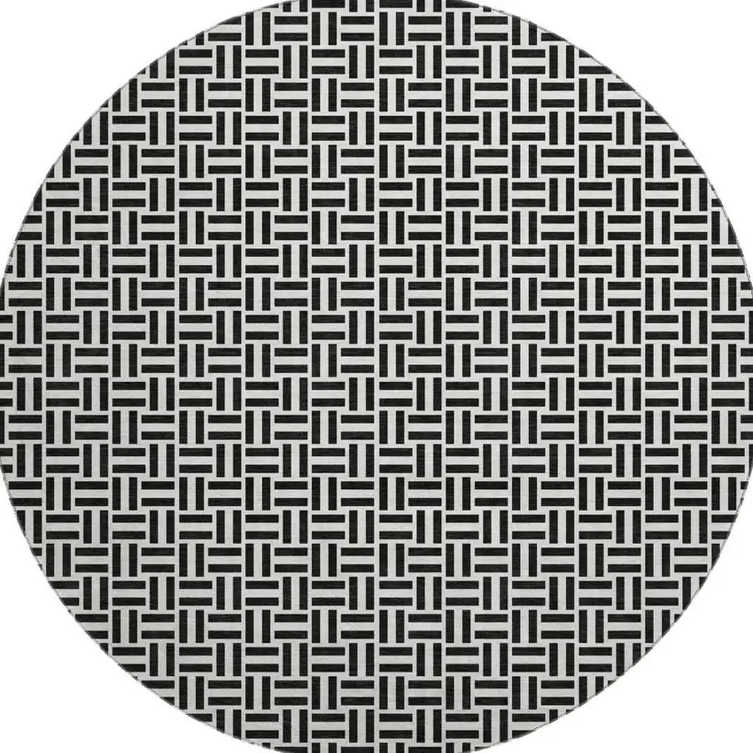8' Black And Ivory Geometric Washable Round Rug With UV Protection Photo 4