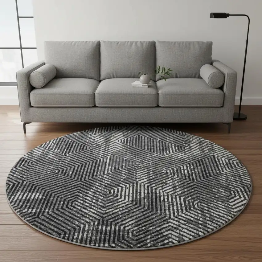 8' Black And Ivory Geometric Washable Round Rug With UV Protection Photo 2